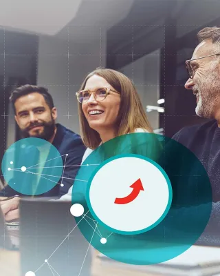 Ein Team von BITOU im Brainstorming, strategische Visionen auf Bildschirmen darstellend, symbolisiert durch DOTS Expertise in Corporate Transformation und Branding – ein Sinnbild für innovative Teamförderung und zielgerichtete Unternehmensentwicklung.